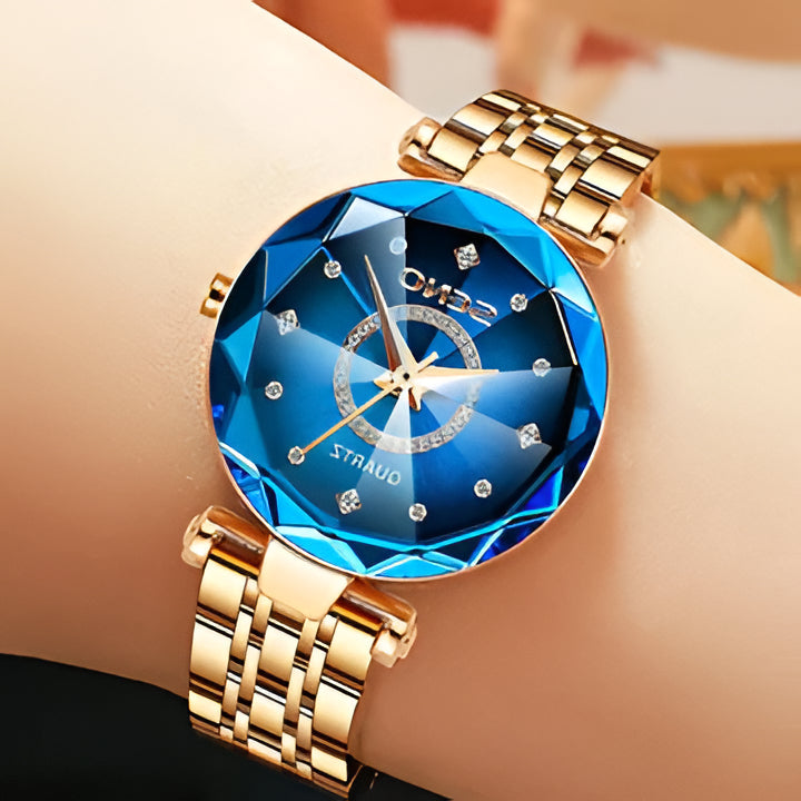 Elegant women's starry stainless steel watch with a captivating gradient dial. Perfect fashion accessory for her.