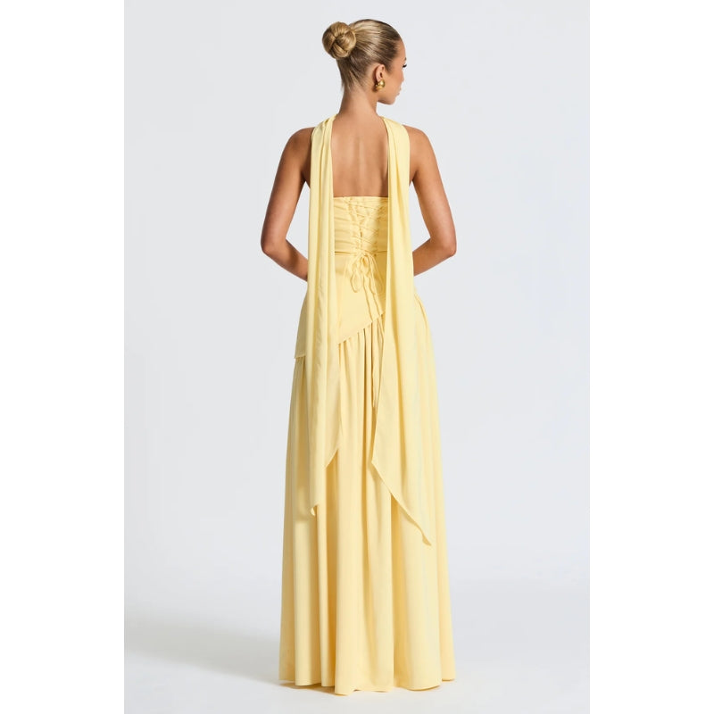 Chic flowing strapless maxi dress for women, featuring a stylish asymmetric hem.