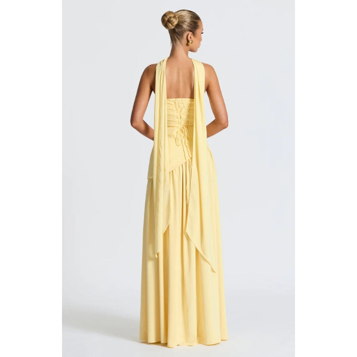 Chic flowing strapless maxi dress for women, featuring a stylish asymmetric hem.