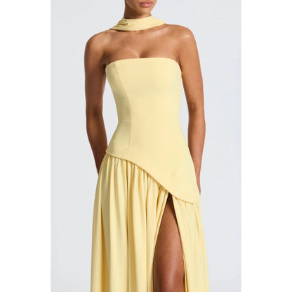 Formal women's evening dress: elegant strapless maxi with a unique asymmetric design.