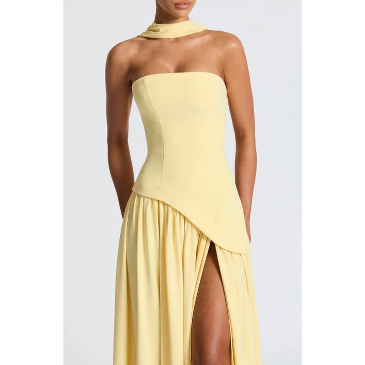 Formal women's evening dress: elegant strapless maxi with a unique asymmetric design.