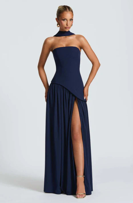 Women's elegant strapless maxi dress. Flowing formal evening gown, perfect as a wedding guest or party dress.