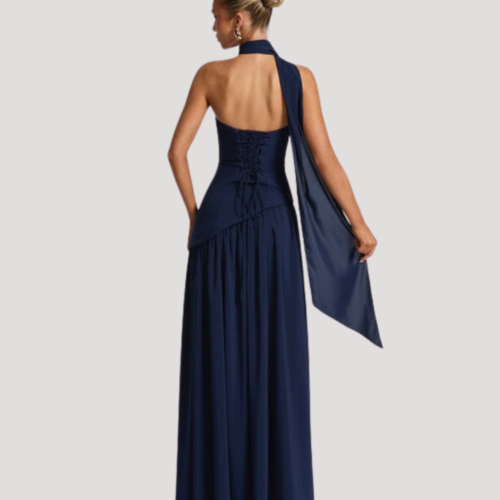 Modern formal women's strapless pleated maxi, sophisticated evening wear.