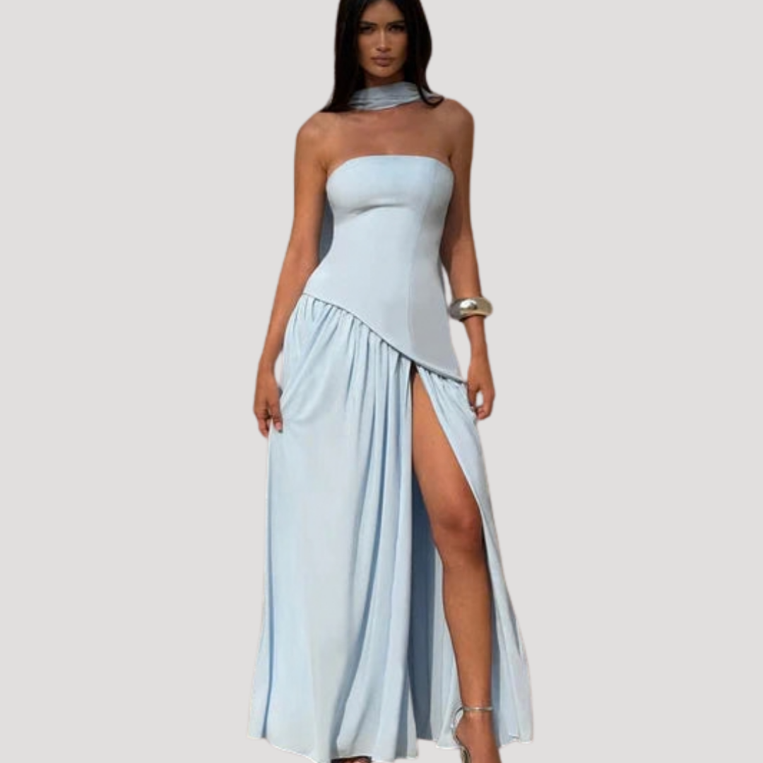 Modern women's long strapless pleated maxi dress, elegant party wear.