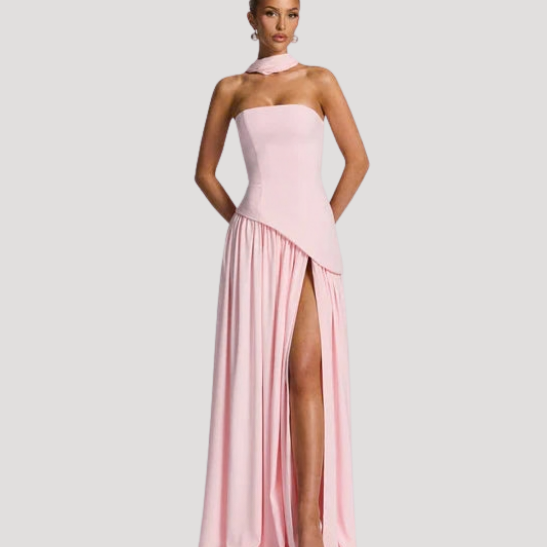 Beautiful elegant women's strapless pleated maxi, a sophisticated evening dress.