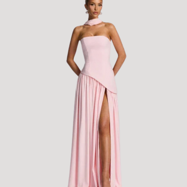 Beautiful elegant women's strapless pleated maxi, a sophisticated evening dress.