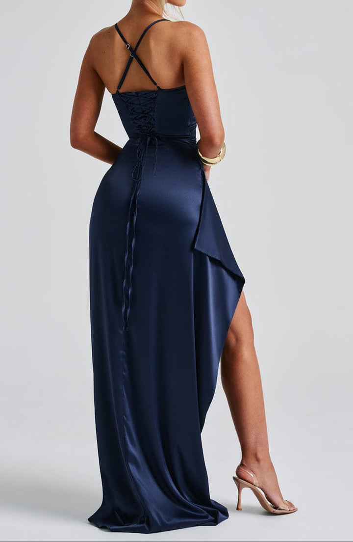 Chic women's formal dress featuring delicate spaghetti straps & a stylish leg slit, ideal for evening events.