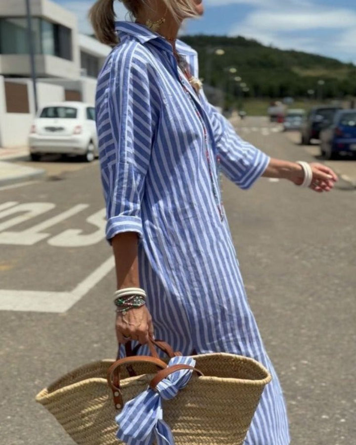 Effortless chic women's striped midi shirtdress. Button-down, versatile, and stylish for any occasion.