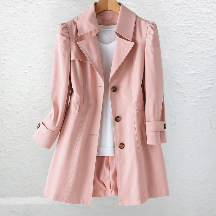 Stylish women's long belted trench coat, structured for workwear or sophisticated office attire.