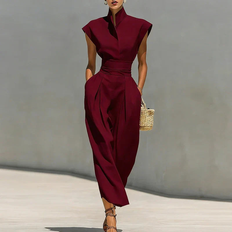 Elegant women's structured midi dress with a cinched waist & long sleeves, perfect for office or cocktail events.