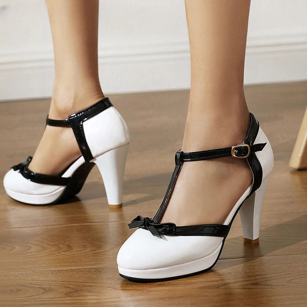 Chic women's dress shoes: T-strap design with a charming bow detail and sturdy block heel footwear.