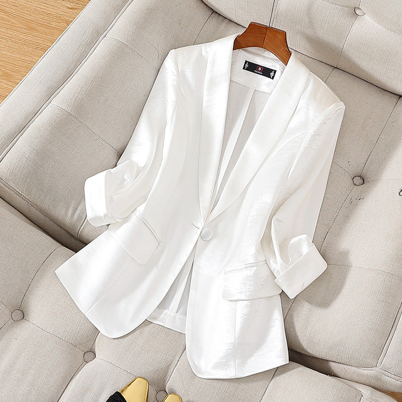 Chic pink tailored blazer for women, ideal for sophisticated office attire or versatile formal jacket.