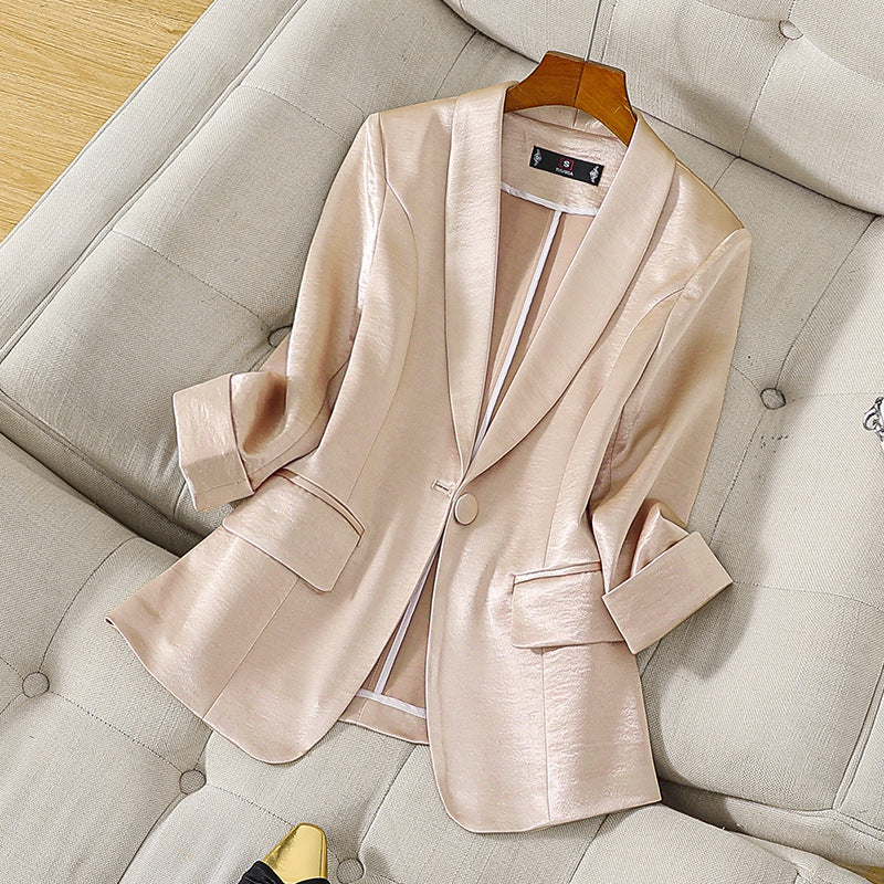 Professional cream tailored blazer, an elegant women's jacket for business wear, offering sophisticated style.