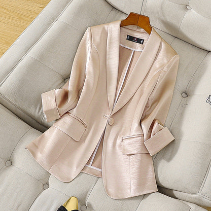 Professional cream tailored blazer, an elegant women's jacket for business wear, offering sophisticated style.