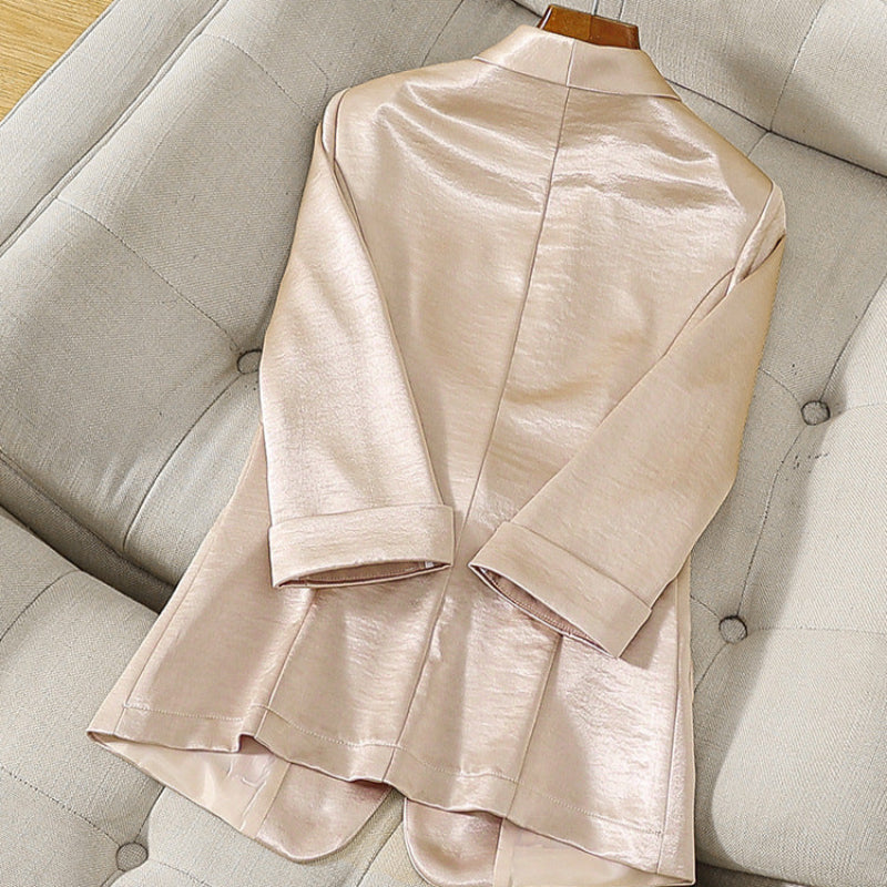 Versatile white women's tailored blazer, a chic formal jacket for office attire, professional and elegant.
