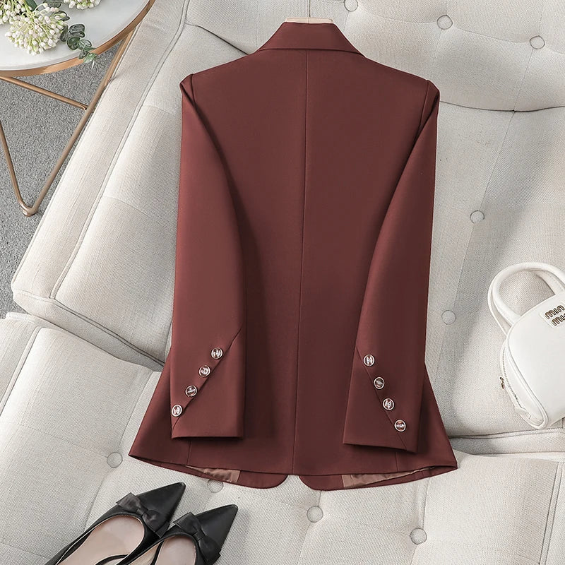 White women's elegant tailored blazer. A chic choice for professional sophistication & formal wear.