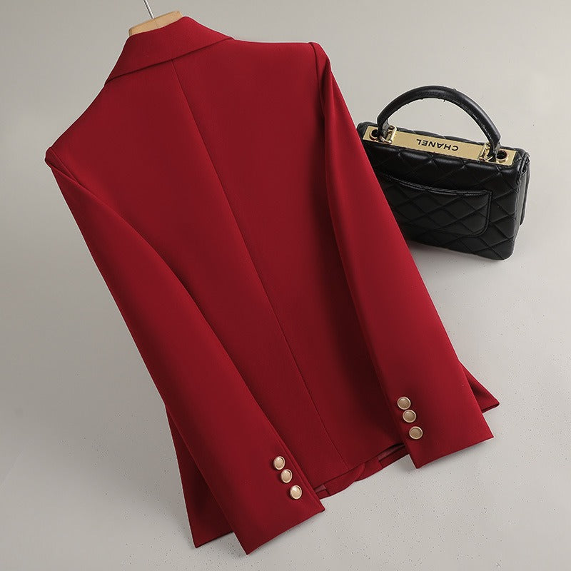 Chic women's tailored blazer, an elegant statement outerwear piece for sophisticated style.