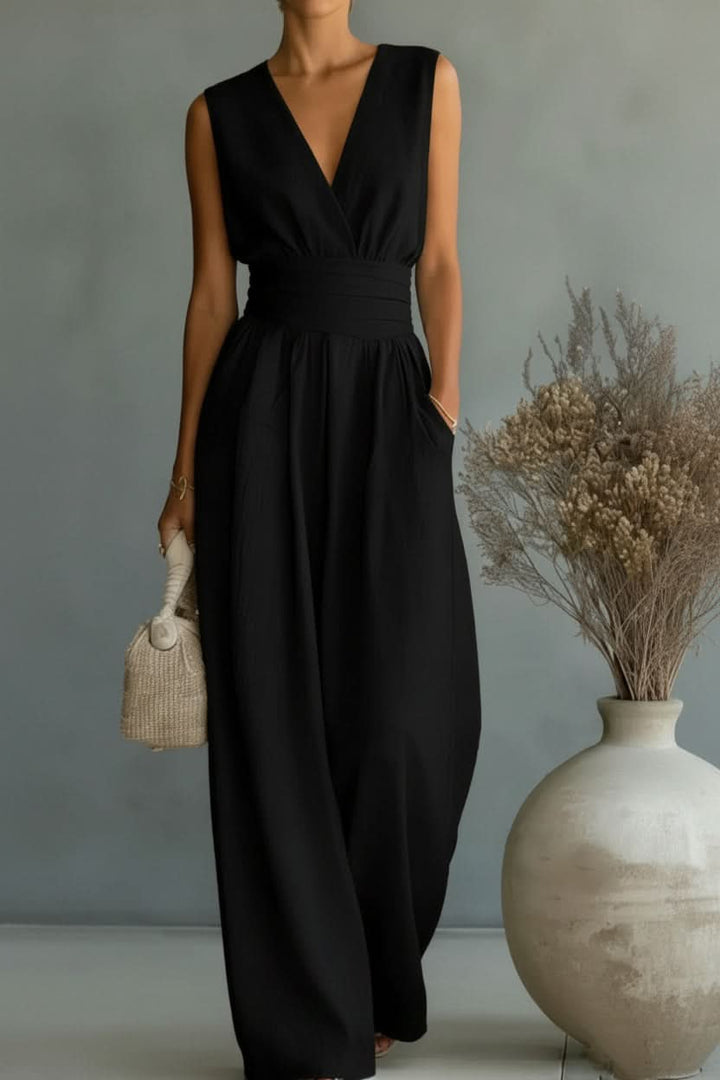 Elegant women's tailored cross waist top & pant duo set. Ideal for professional or business casual wear.