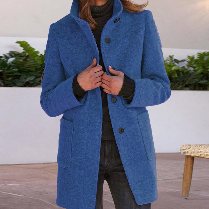 Chic tailored women's mid-length coat, ideal workwear outerwear with button details for a professional look.