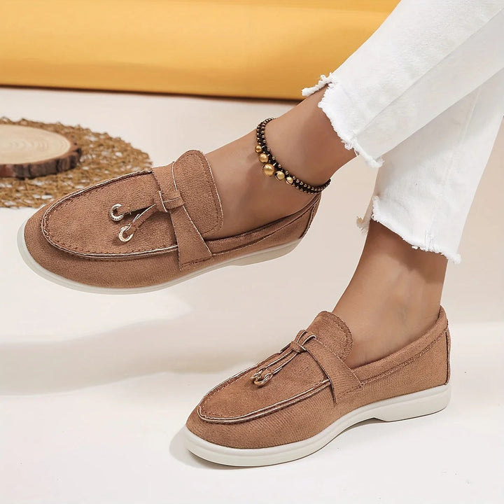 Elegant women's tassel loafers, perfect slip-on shoes for sophisticated office wear & casual chic.