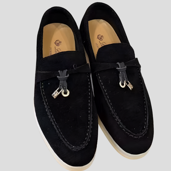 Stylish women's black tassel loafers, offering comfortable footwear and versatile fashion for everyday.