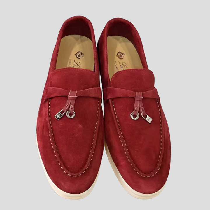 Sophisticated women's fashion loafers, featuring a sleek slip-on design for ultimate comfort.