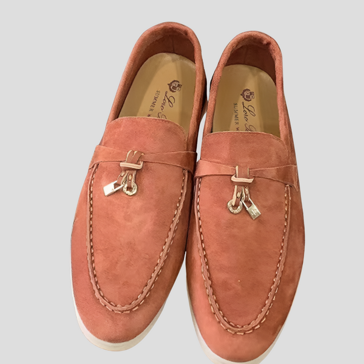 Close-up of women's polished tassel loafers, highlighting the detailed design and comfortable fit.