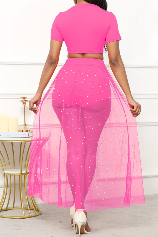 Women's chic 3-piece summer beach outfit: crop top, sheer maxi skirt & matching cover-up, vacation ready.