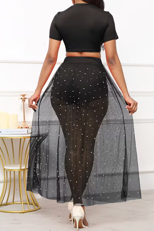 Versatile women's three-piece beach set for summer resort wear: crop top, sheer skirt & cover-up.