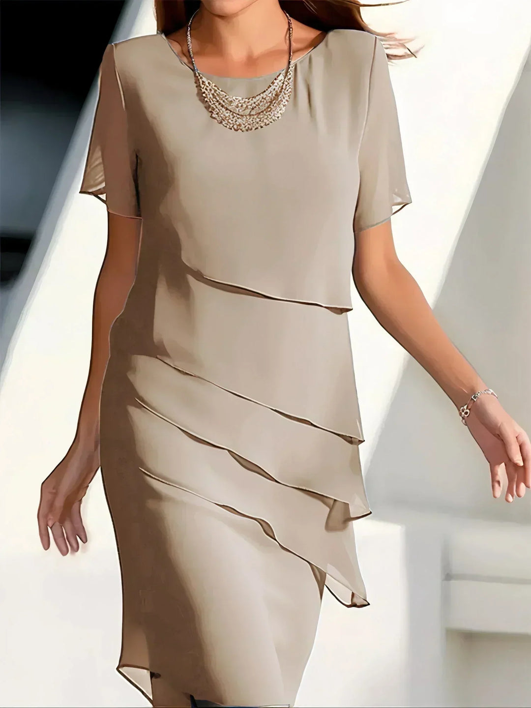 Modern asymmetrical tiered midi dress, short sleeve, offers women a sophisticated & elegant fashion statement.