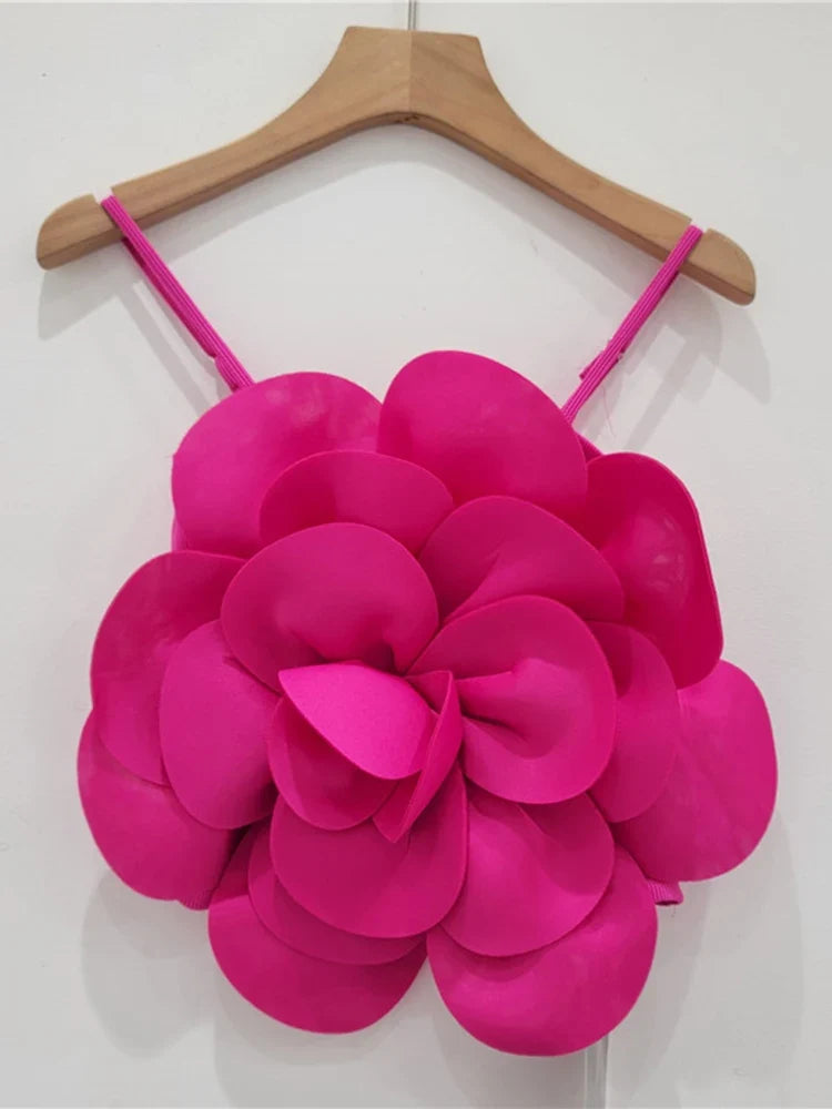 Chic women's floral top with delicate 3D flowers. A stylish statement piece for elegant spring/summer fashion.