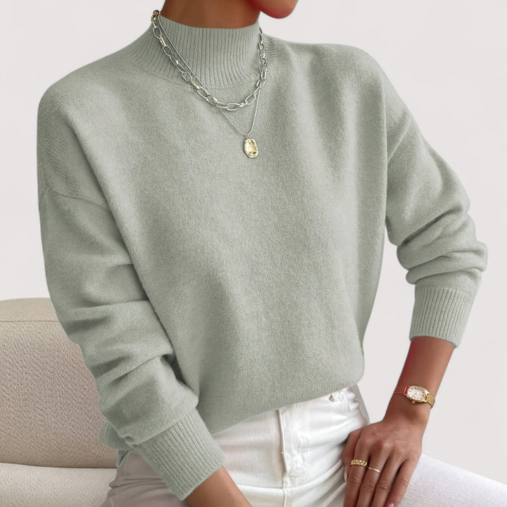 Elegant women's turtleneck knit sweater, cozy & comfortable. Chic long sleeve pullover for fall & winter fashion.