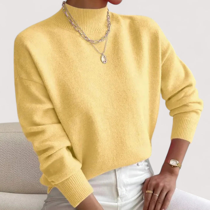 Versatile women's chic turtleneck sweater for elegant fall & winter style. Comfortable long sleeve knit pullover.