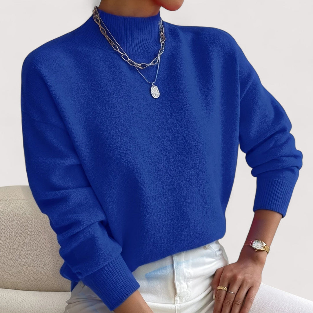 Women's comfortable & elegant turtleneck sweater. Cozy knit long sleeve pullover, essential for winter fashion.