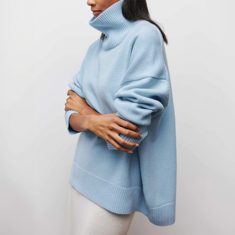 Stylish women's long sleeve turtleneck sweater, essential for winter fashion.