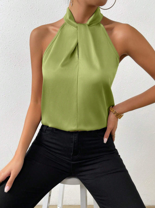 Stylish women's top with elegant twist knot, perfect for work or a night out. Versatile.