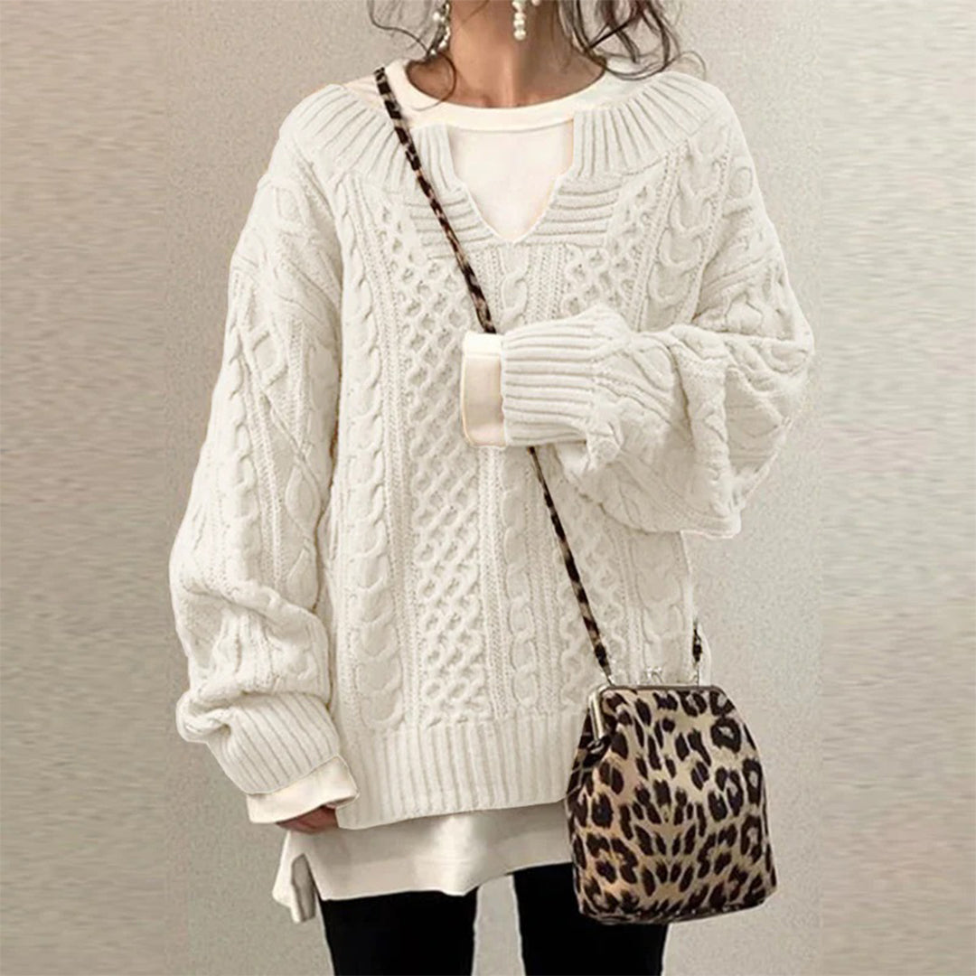 Elegant women's twisted knit winter sweater, a cozy long sleeve top perfect for stylish fall and winter fashion.