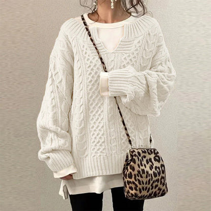Elegant women's twisted knit winter sweater, a cozy long sleeve top perfect for stylish fall and winter fashion.