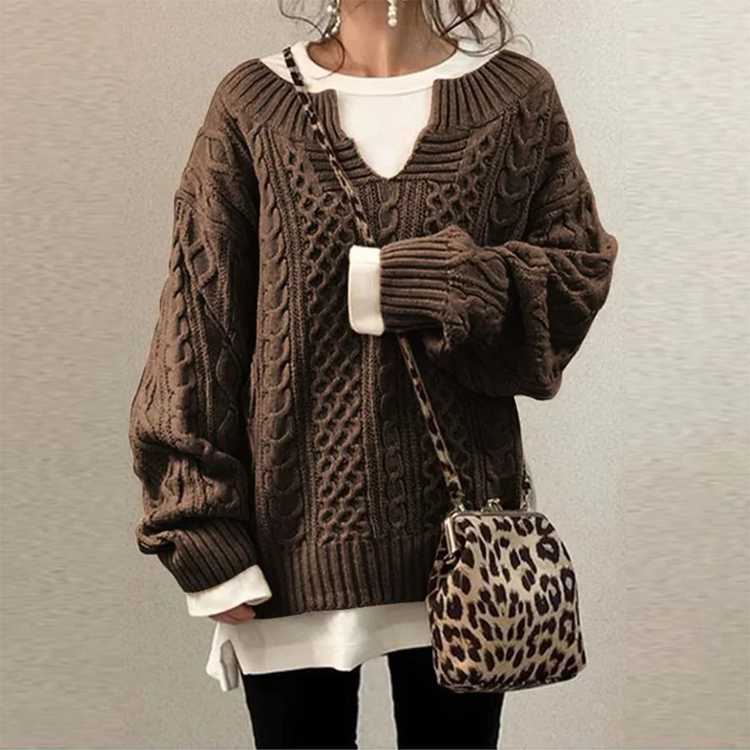 Warm and comfortable women's twisted knit sweater, ideal for cozy long sleeve fall and winter chic outfits.