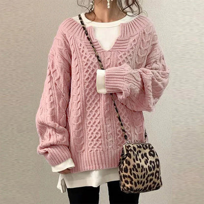 Stylish women's twisted knit sweater, an elegant long sleeve top for casual chic fall and winter clothing.
