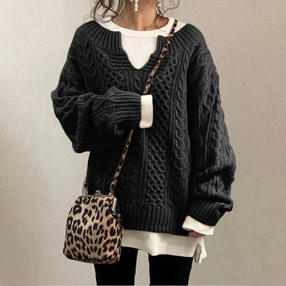 Cozy women's twisted knit sweater, a warm long sleeve top for comfortable and elegant winter fashion.