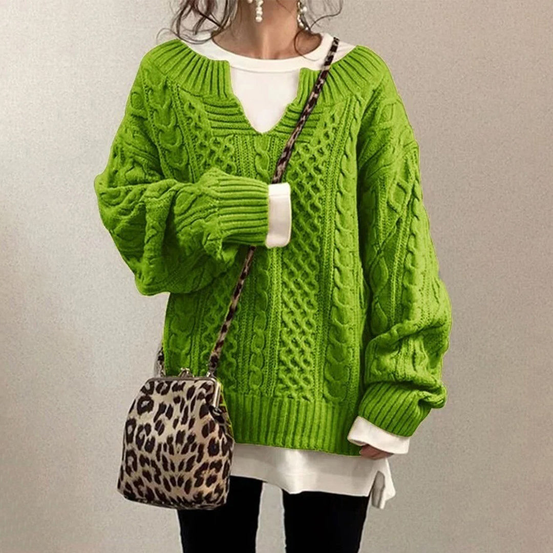 Chic women's twisted knit sweater, a comfortable and warm long sleeve top perfect for elegant winter style.