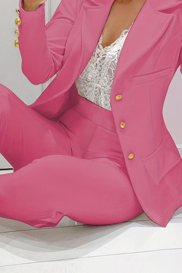 Modern women's two-piece blazer and pant set for a sleek, contemporary look.