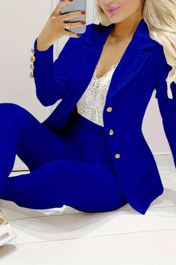Stylish women's office wear suit, complete with a fitted blazer and straight pants.