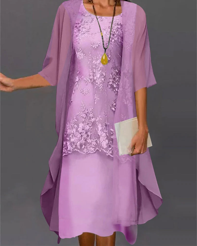 Elegant women's two-piece blue chiffon dress for special occasions; long, flattering fit, sophisticated formal wear.
