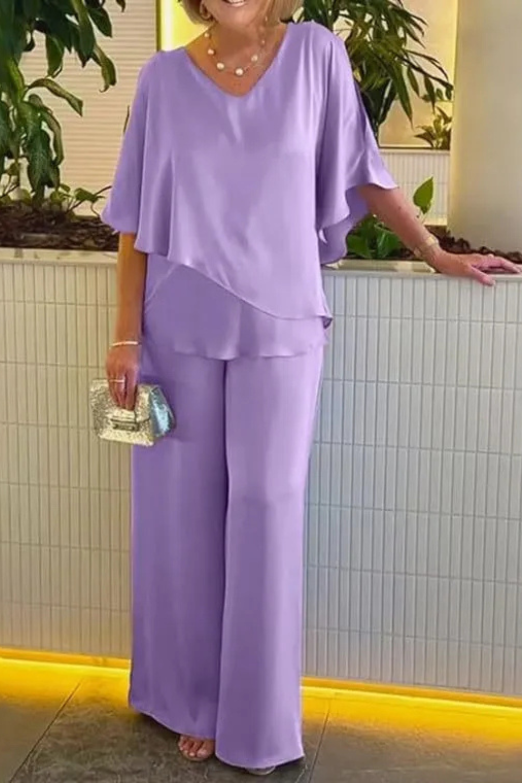 Chic women's matching set: Batwing V-neck top & wide-leg trousers, perfect for a sophisticated look.