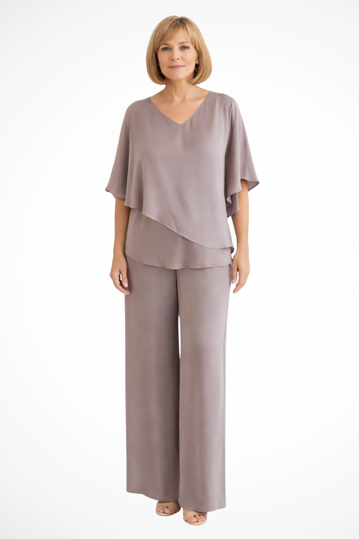 Elegant women's two-piece ensemble featuring a V-neck batwing top & wide-leg pants. Sophisticated.