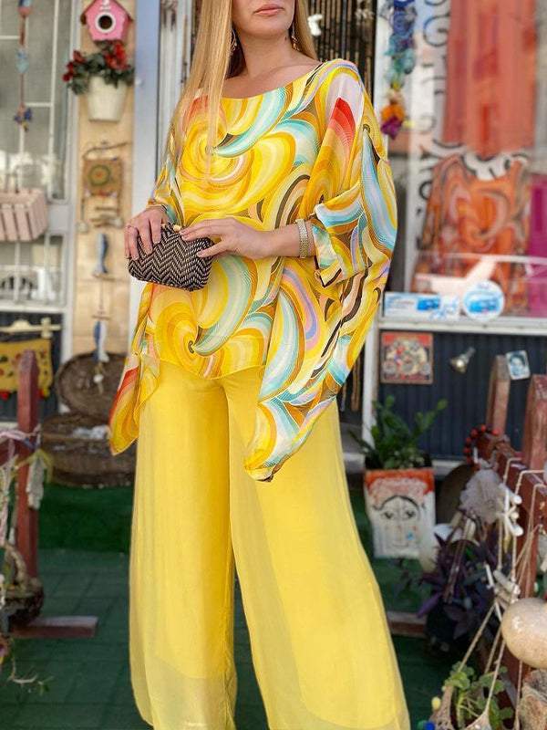 Boho chic women's two-piece set featuring a colorful artistic swirl print, relaxed fit for summer comfort.