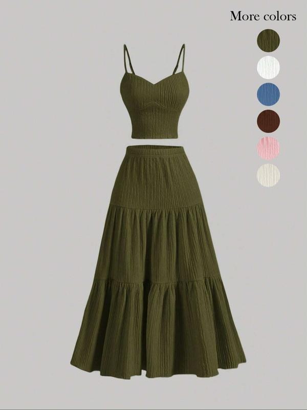 Elegant women's two-piece skirt set with cami top & midi skirt, perfect for versatile day-to-night wear.