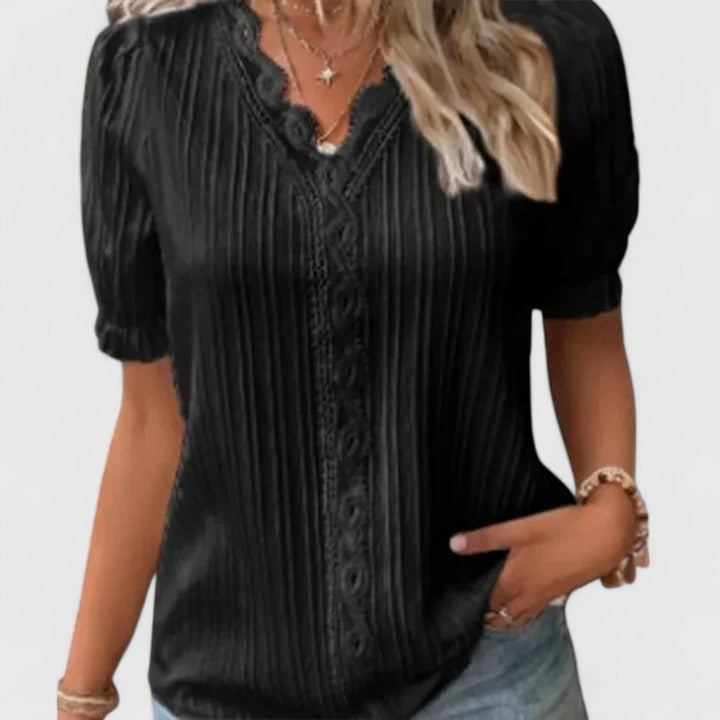 Elegant women's V-neck blouse with stylish hollow short sleeves, perfect for chic summer fashion.